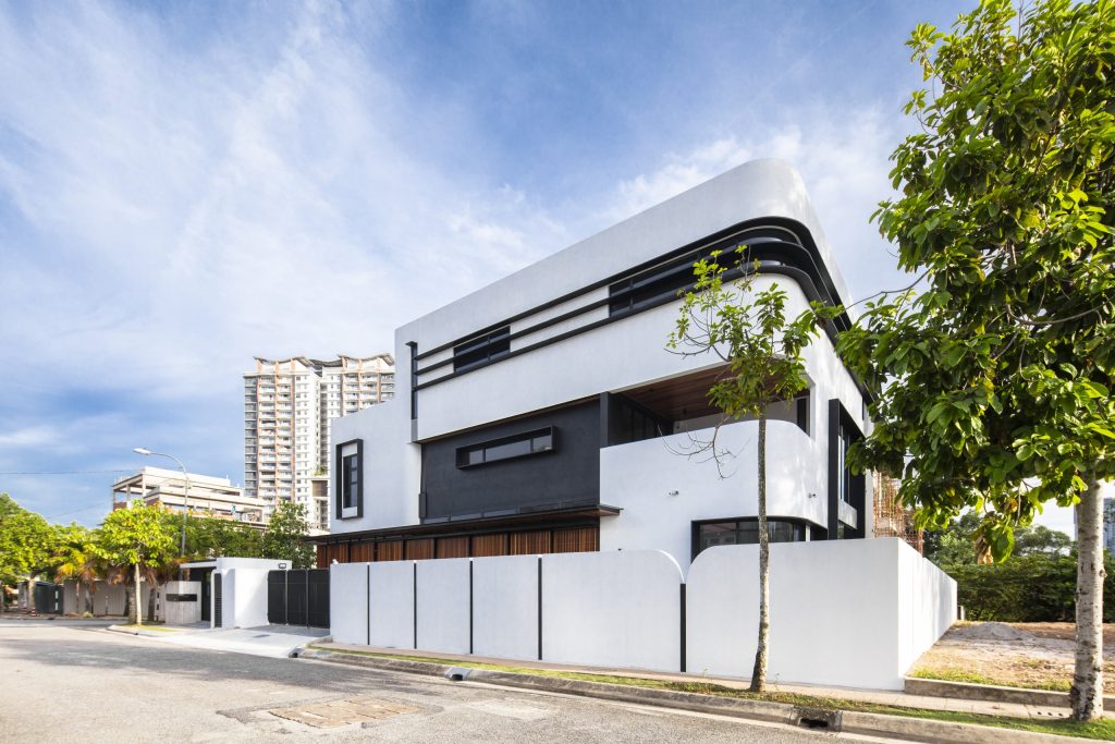 Fillet House: staggered rounded volumes viewed from the street.